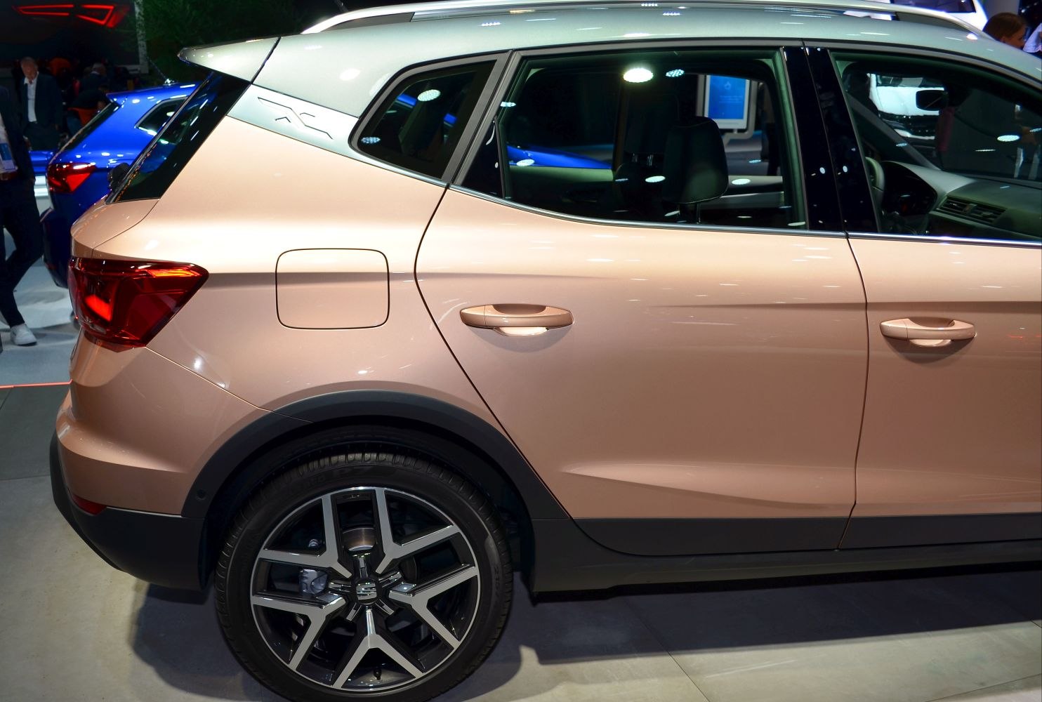 Rear side, alloy wheel, door handles, and fuel cap of compact SUV