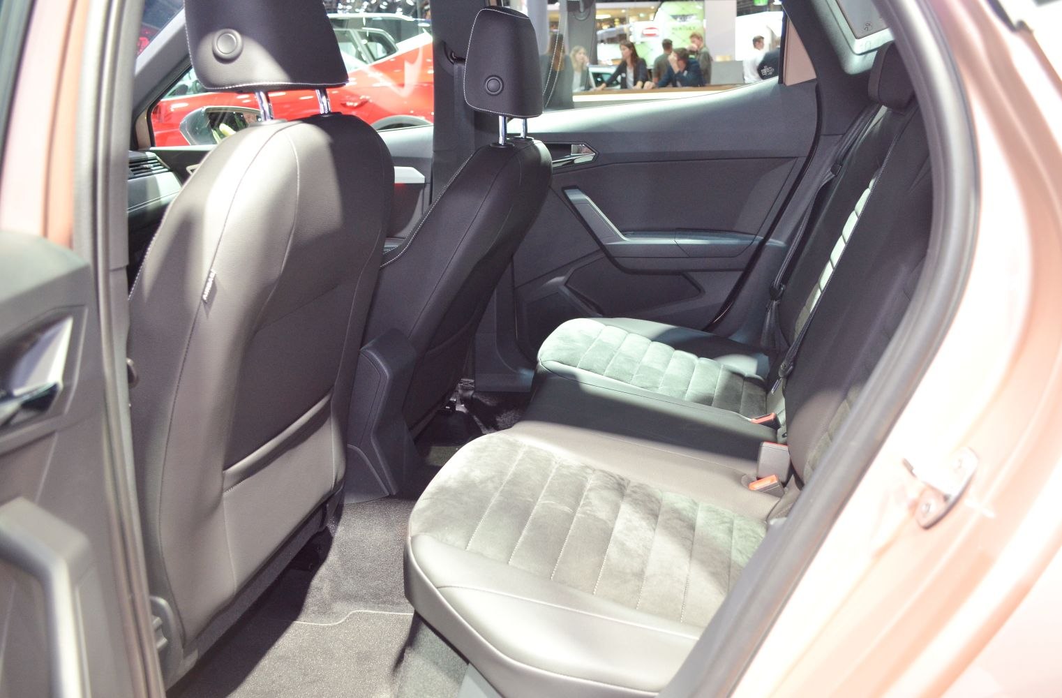 Spacious rear seats with high-quality upholstery and modern door panel design.