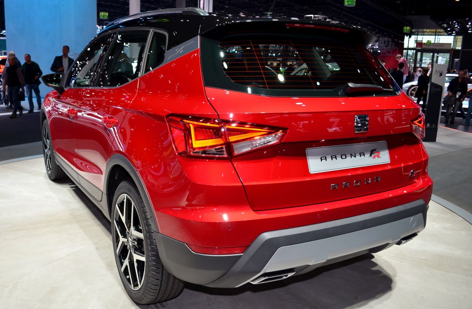 Red compact SUV rear with LED tail lights and alloy wheels