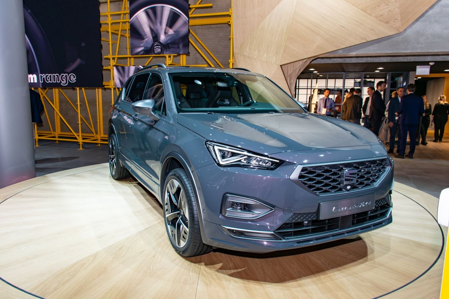 Sharp LED headlights and bold grille design on modern SUV front.