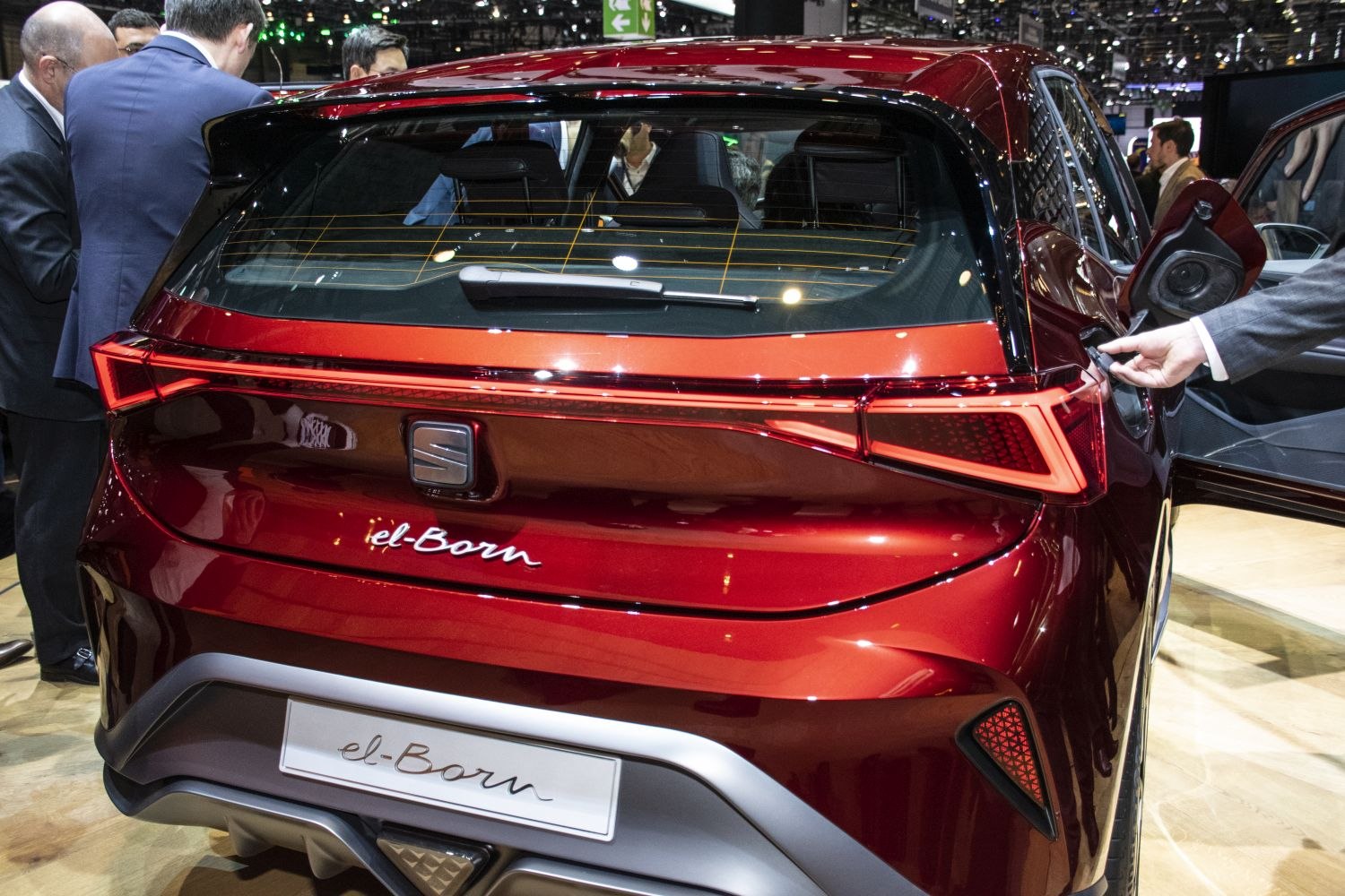 Rear view of sleek electric hatchback with unique tail light design
