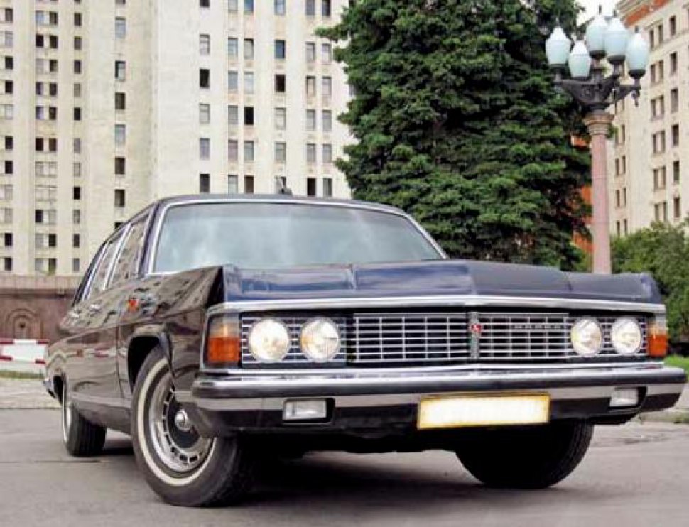 Classic sedan front with quad round headlights and chrome grille