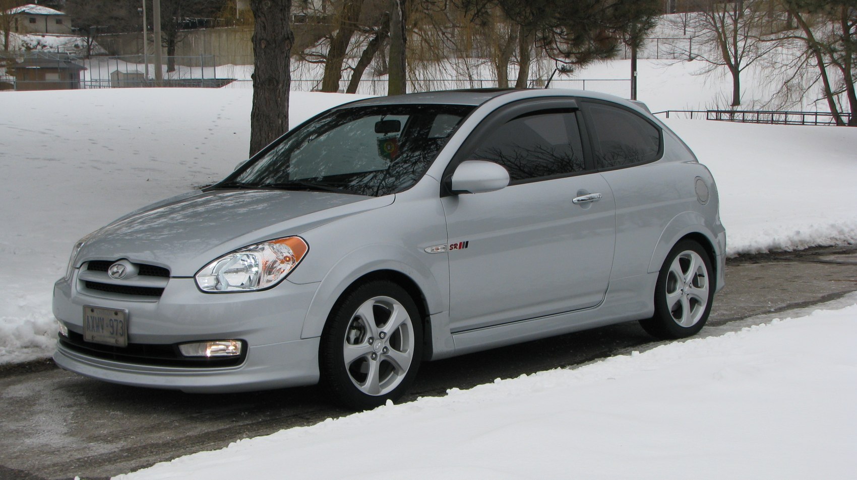 Silver 3-door sporty hatchback with alloy wheels
