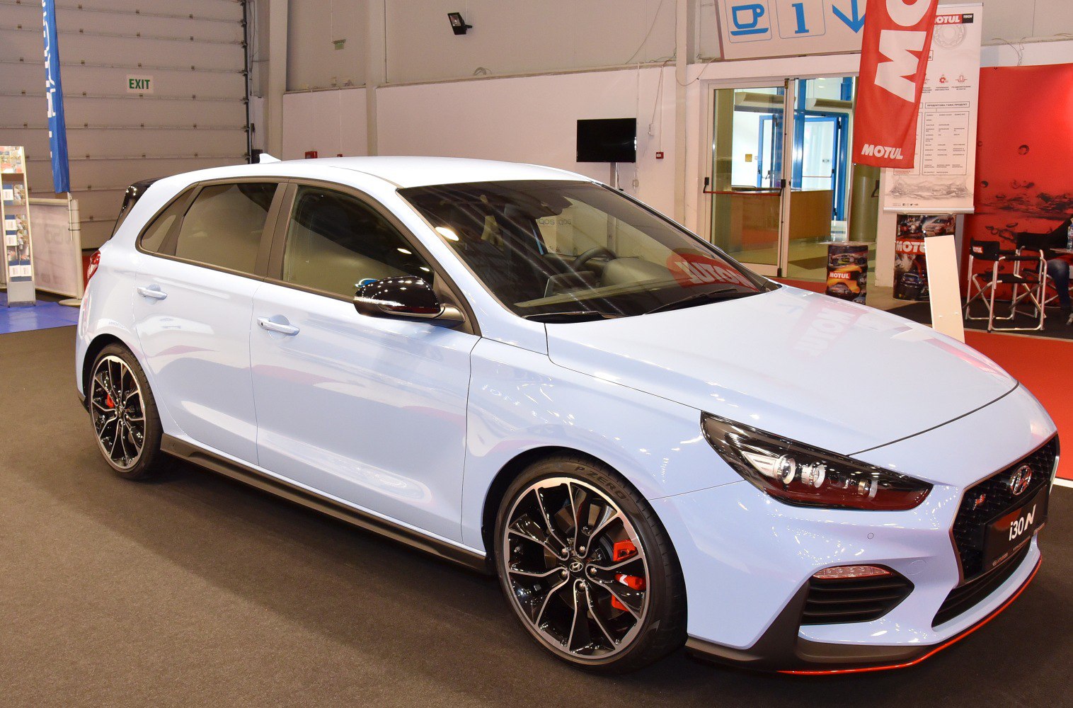 sporty alloy wheels and aerodynamic front side view