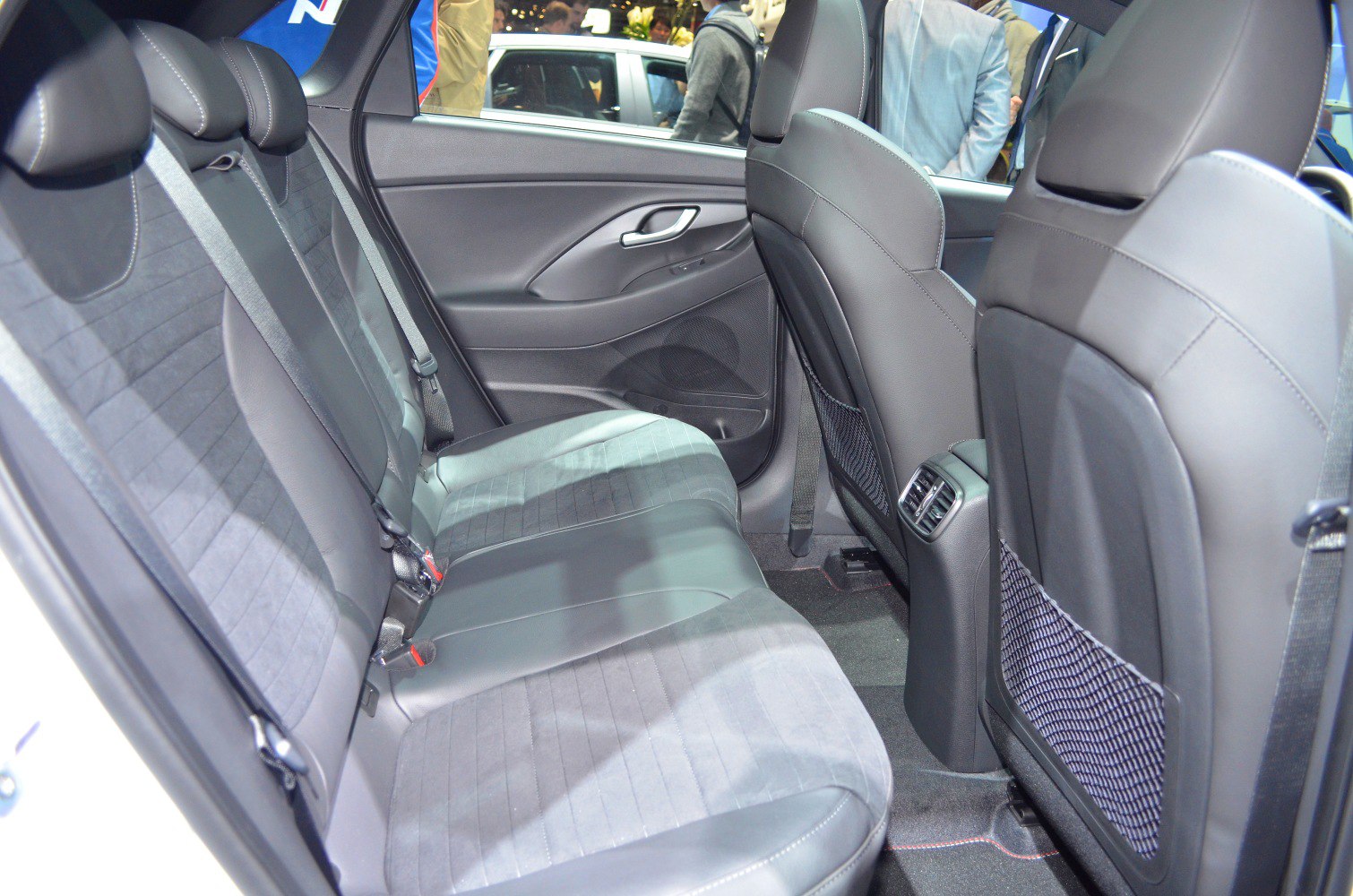 Rear seat interior with upholstery and rear air vents