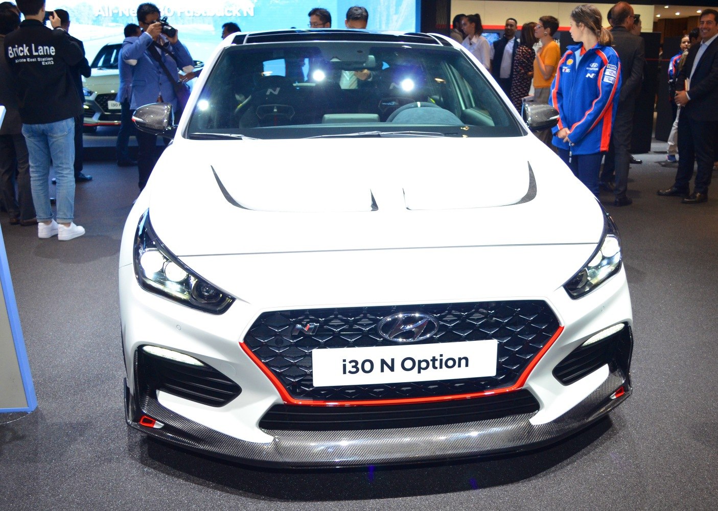 Sporty front grille and carbon fiber splitter of a performance hatchback