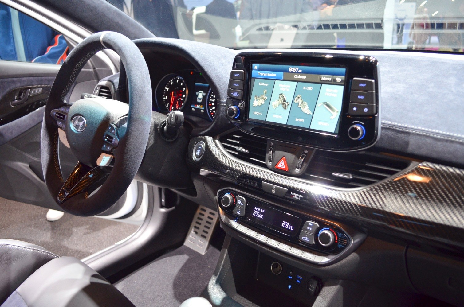 Steering wheel and dashboard with touchscreen and climate controls