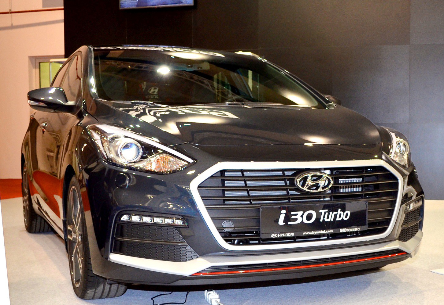 Front grille with Hyundai emblem and LED daytime running lights.