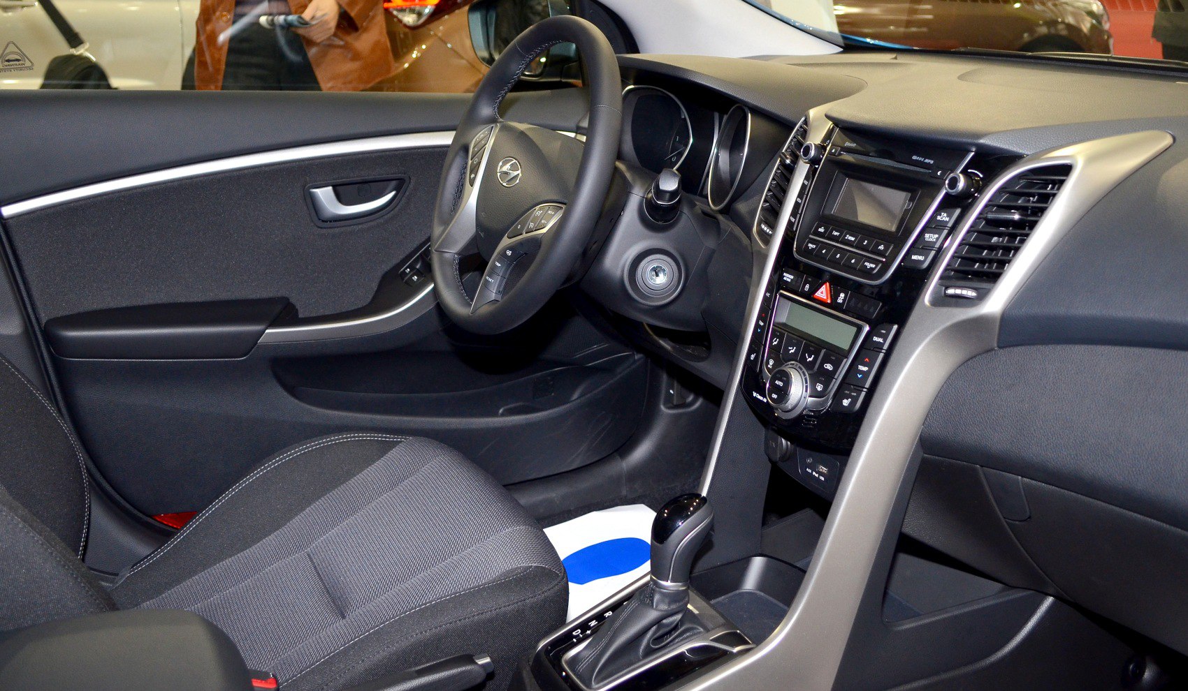 Interior dashboard and multifunction steering wheel with gear shifter