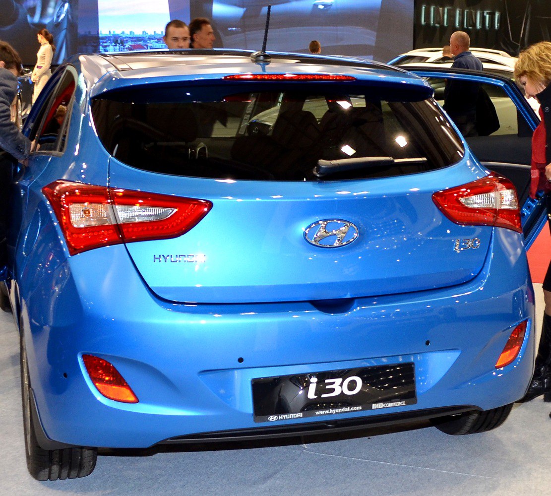 Rear view highlighting tail lights and hatchback rear design.