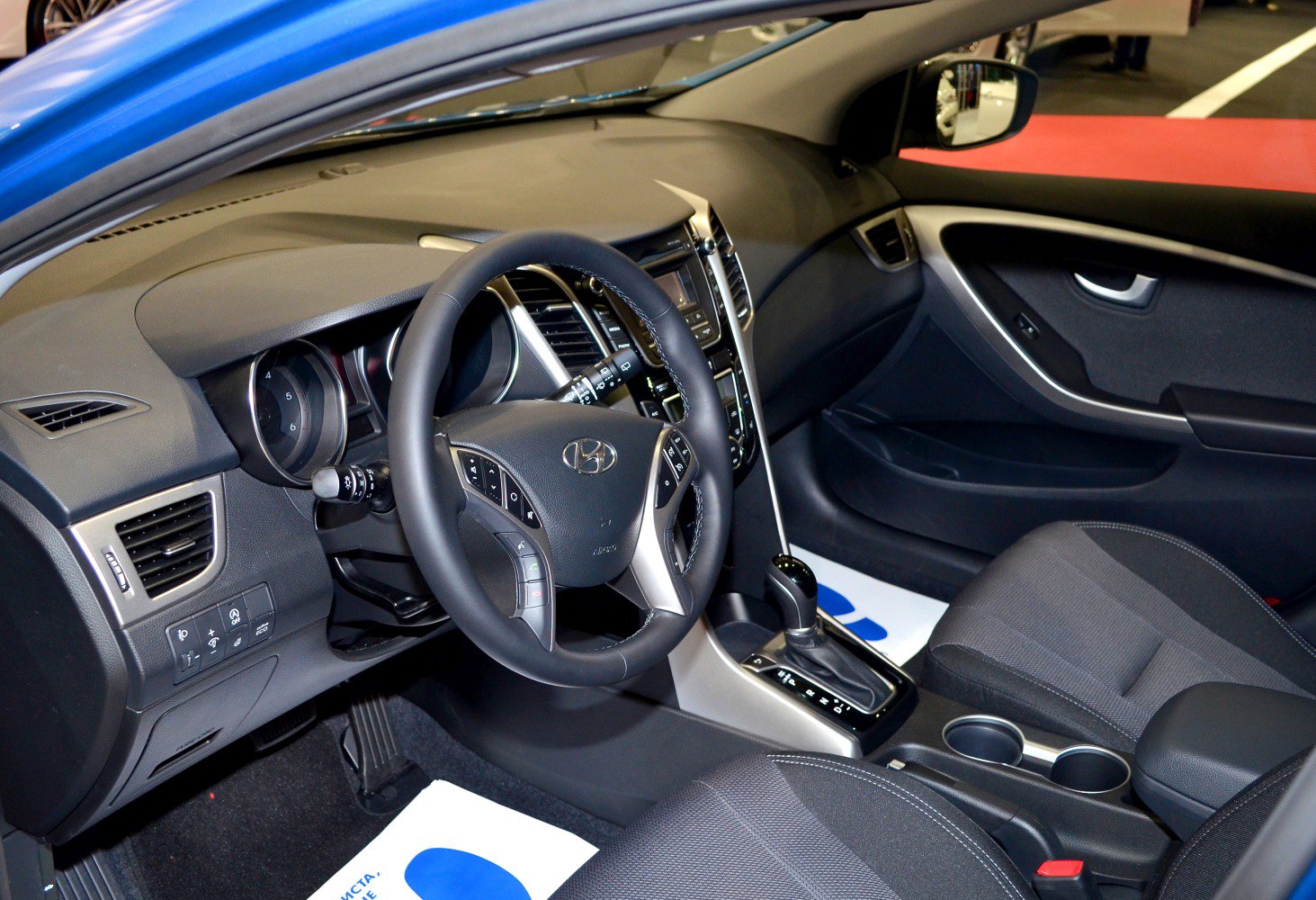 Dashboard, steering wheel, and center console of a modern car interior