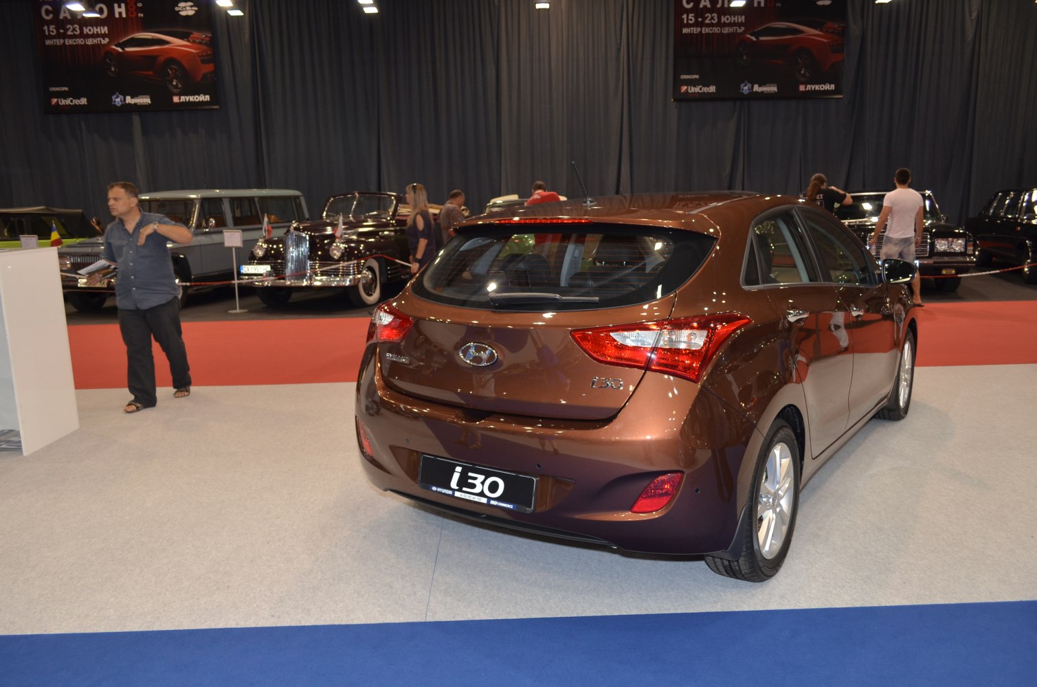 Rear view of a hatchback with distinctive tail lights and sleek design