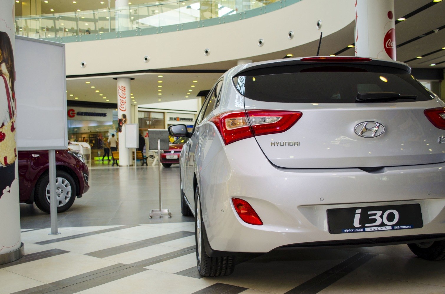 Rear hatch and taillight design of a hatchback in indoor showroom