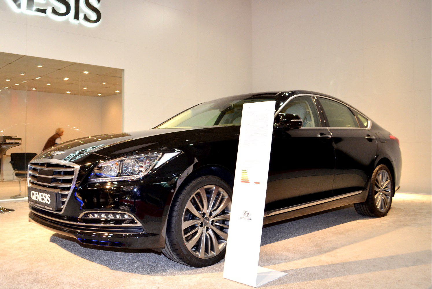 Luxury sedan frontal and side profile with alloy wheels