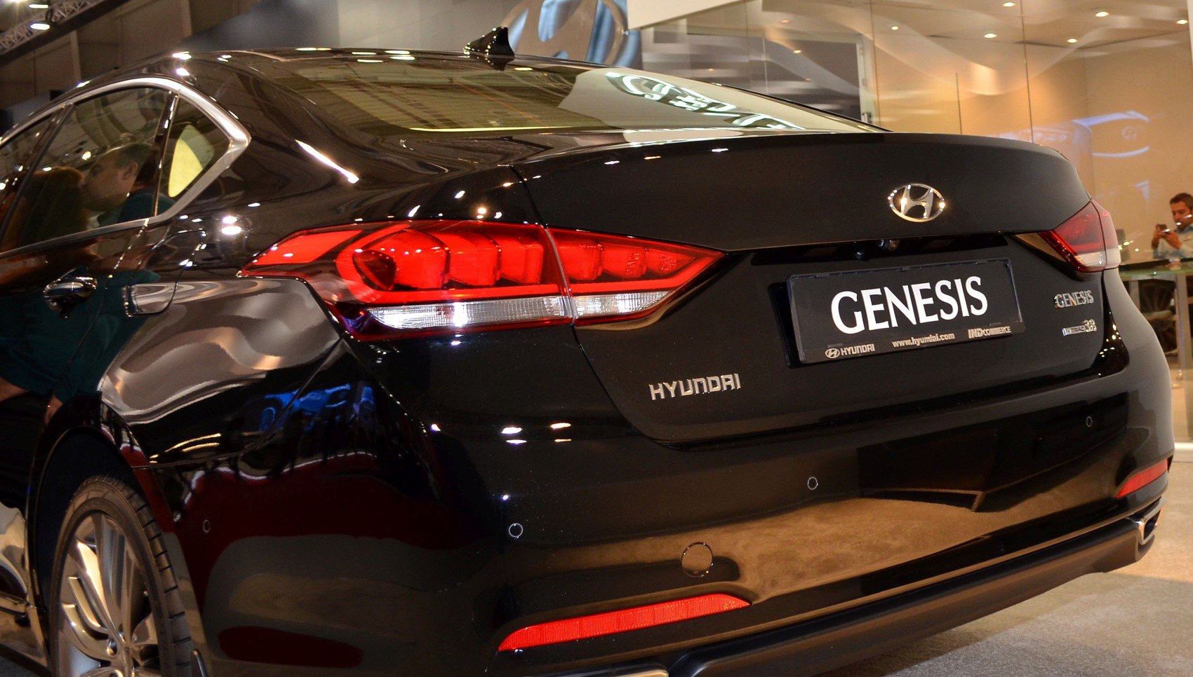 Close-up of rear section with taillights and emblems