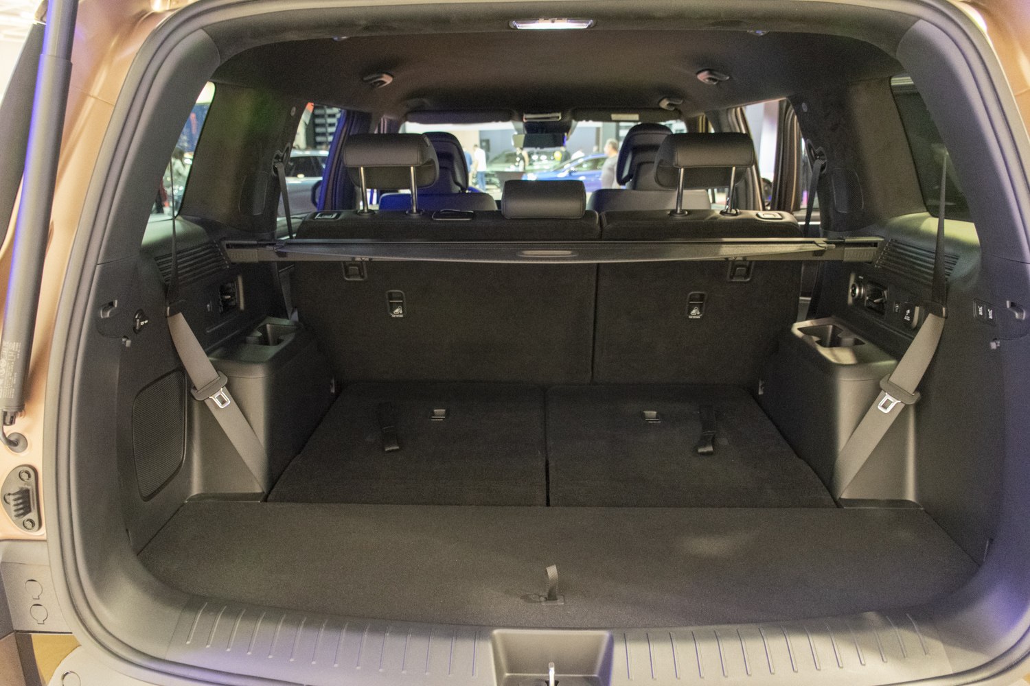 SUV rear cargo area with foldable rear seats and ample storage space