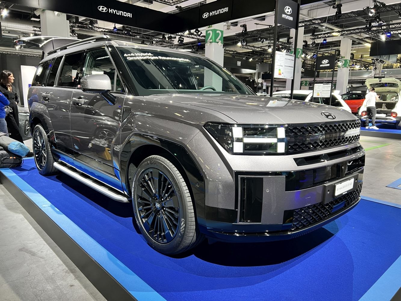 Front angle showing LED headlights and mesh grille on an SUV.