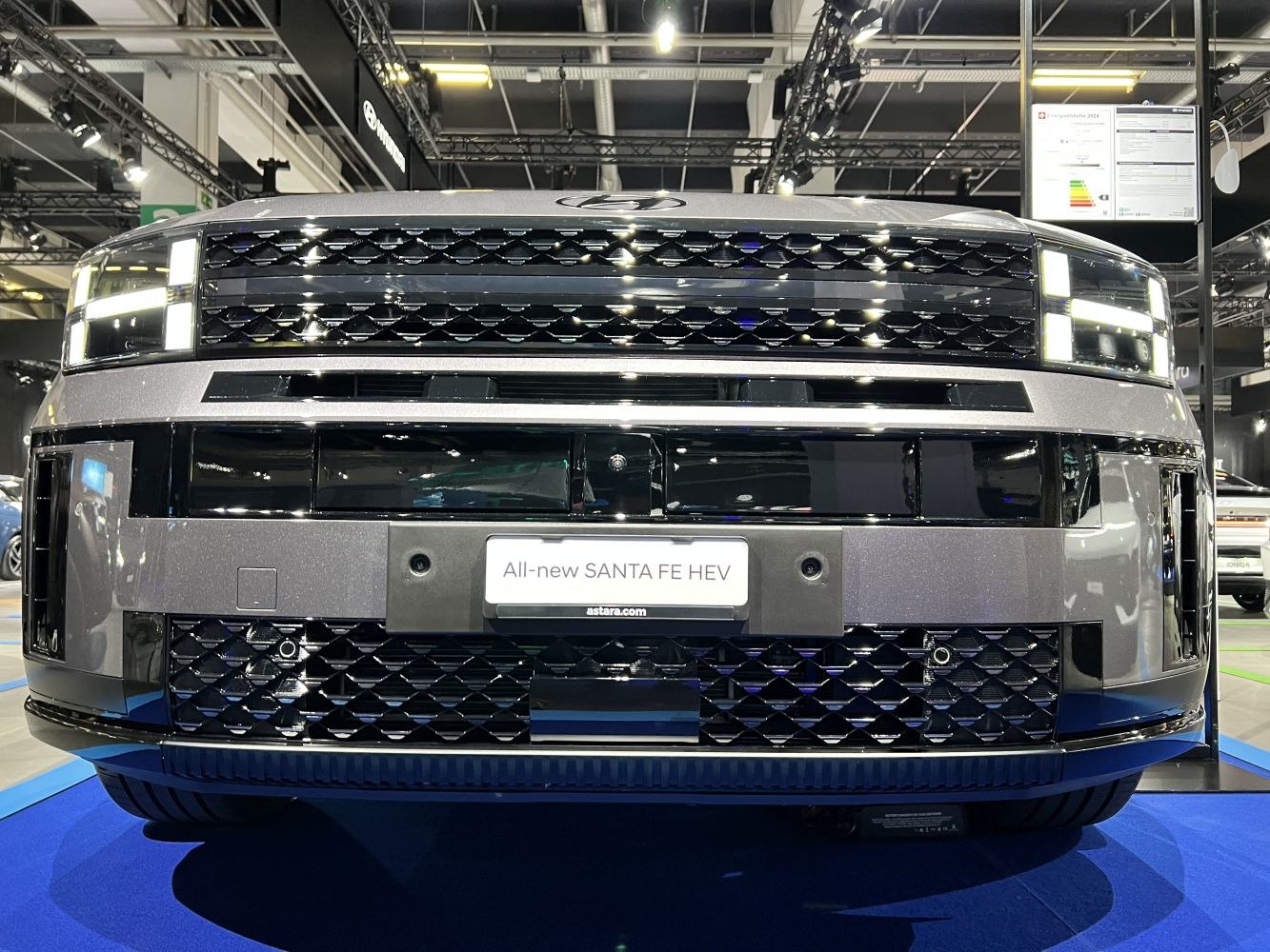 SUV front grille with LED headlights and angular bumper design