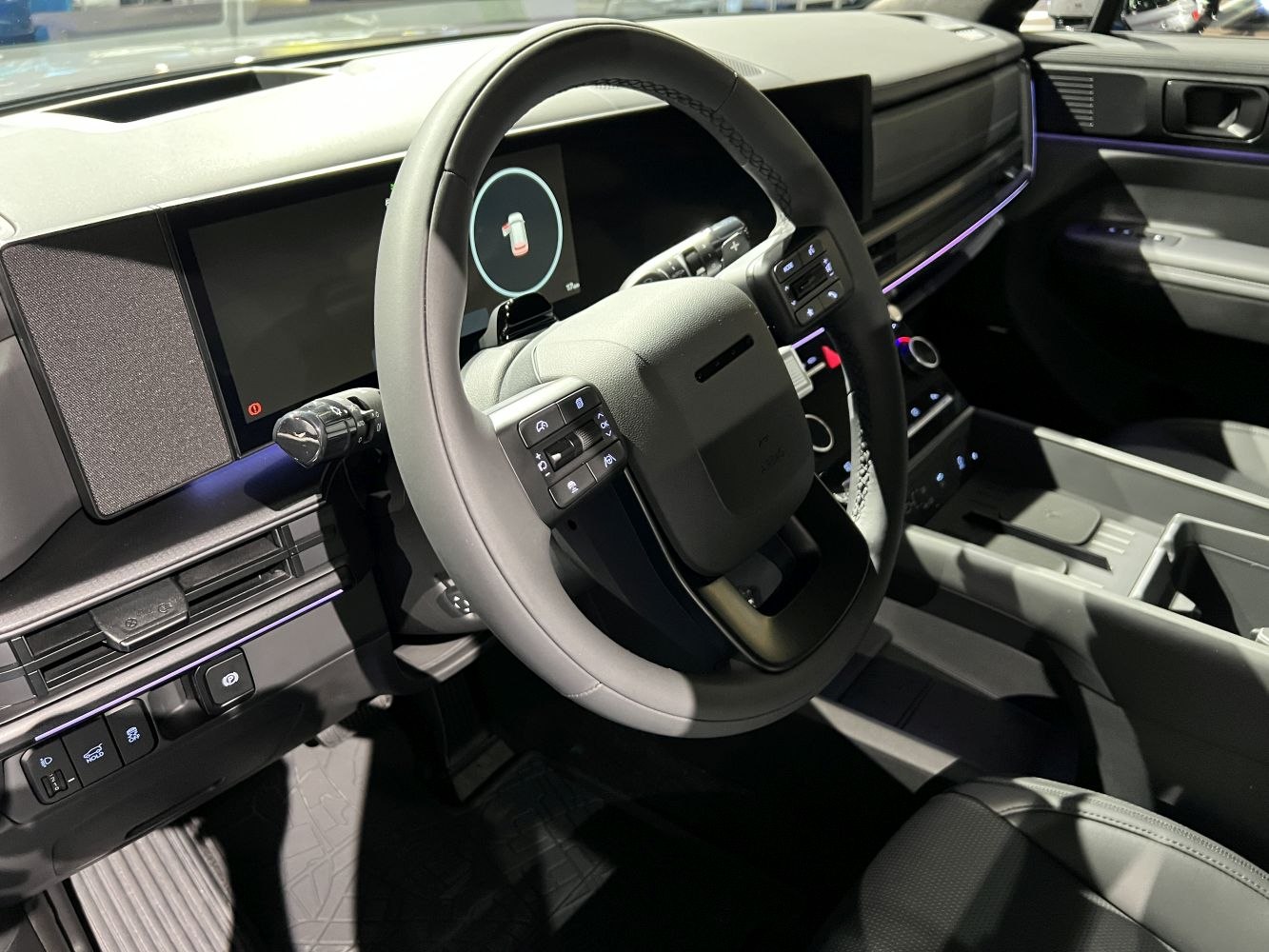 Digital dashboard with instrument cluster and multifunction steering wheel