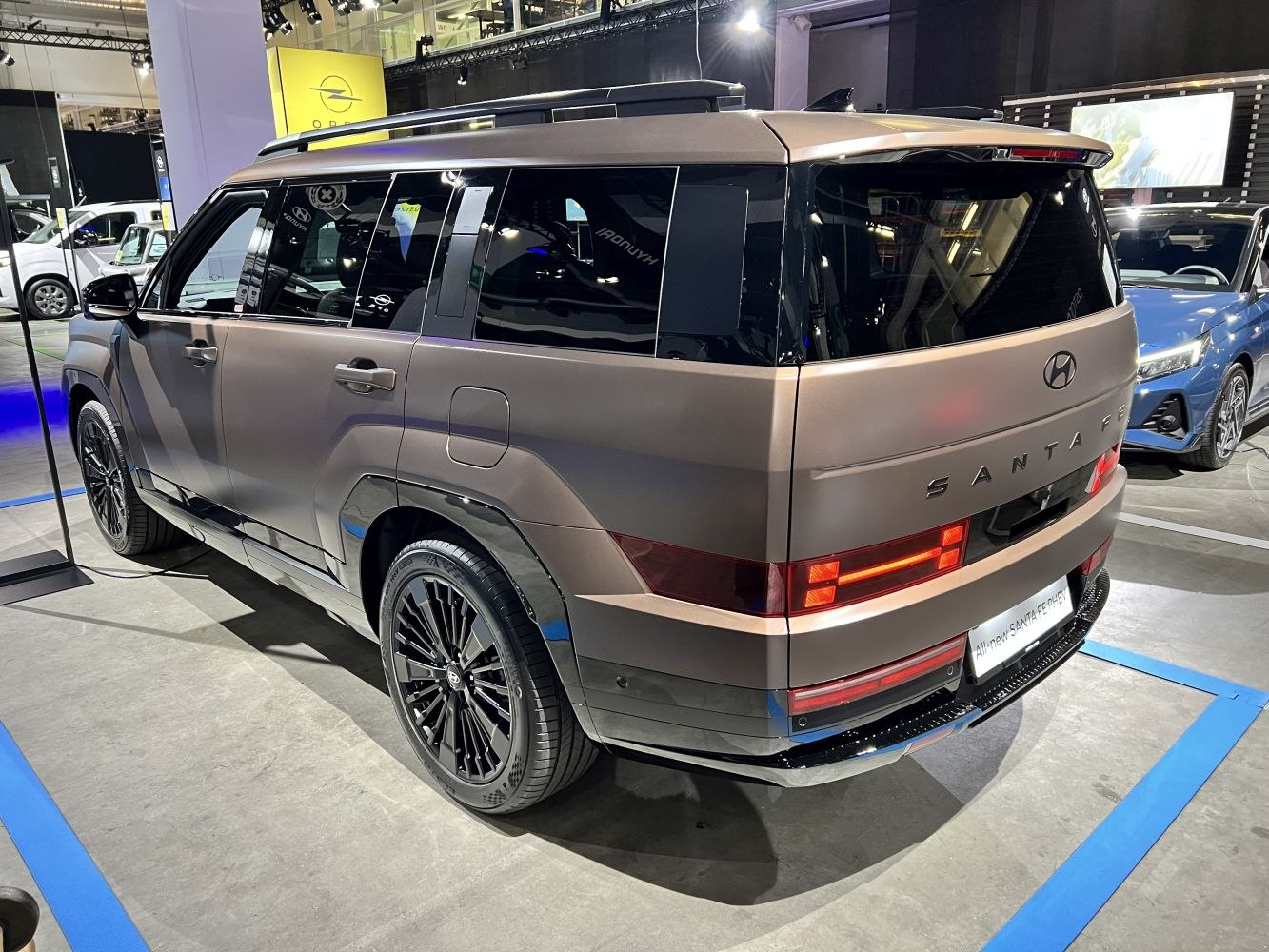 Rear side view of SUV with distinctive LED tail lights and black alloy wheels