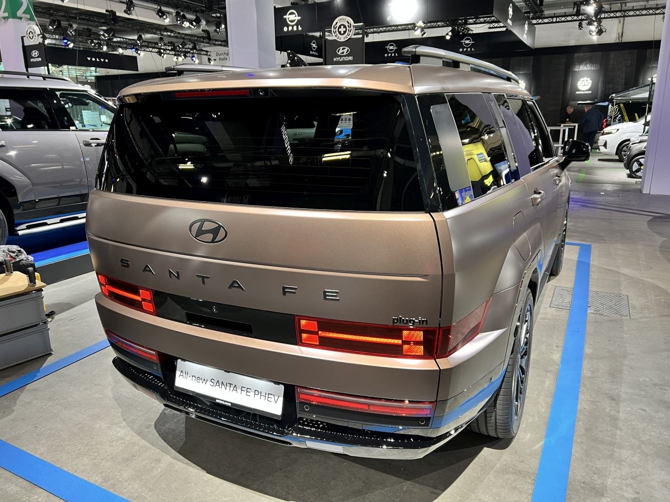 Rear view with distinctive LED tail lights and sleek five-door design
