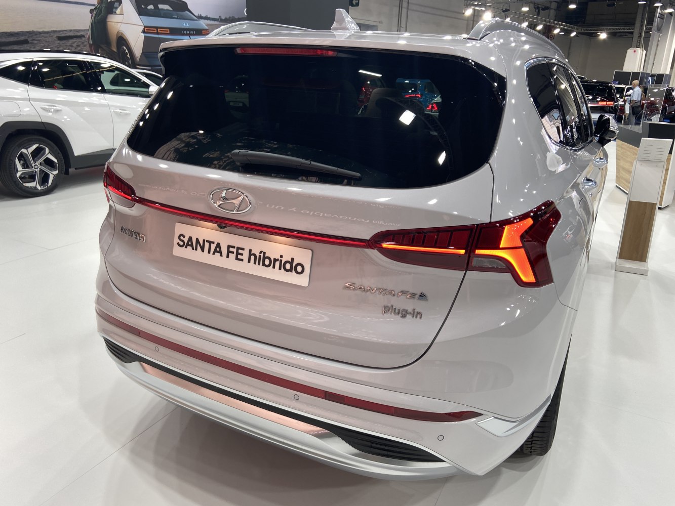 Hybrid plug-in electric SUV with distinctive rear LED taillights and modern bumper design.