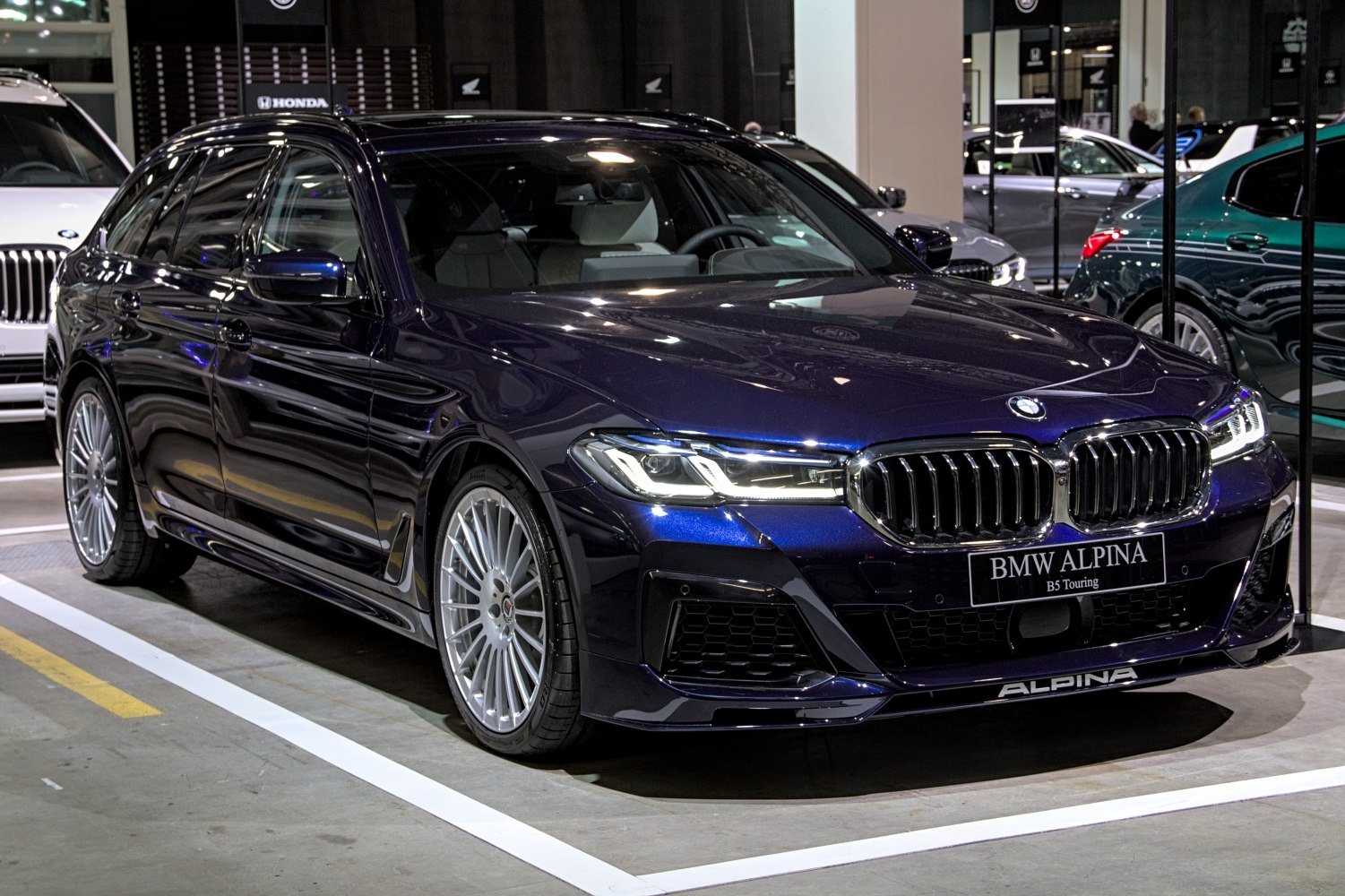 Luxury performance wagon with LED headlights and multi-spoke alloy wheels