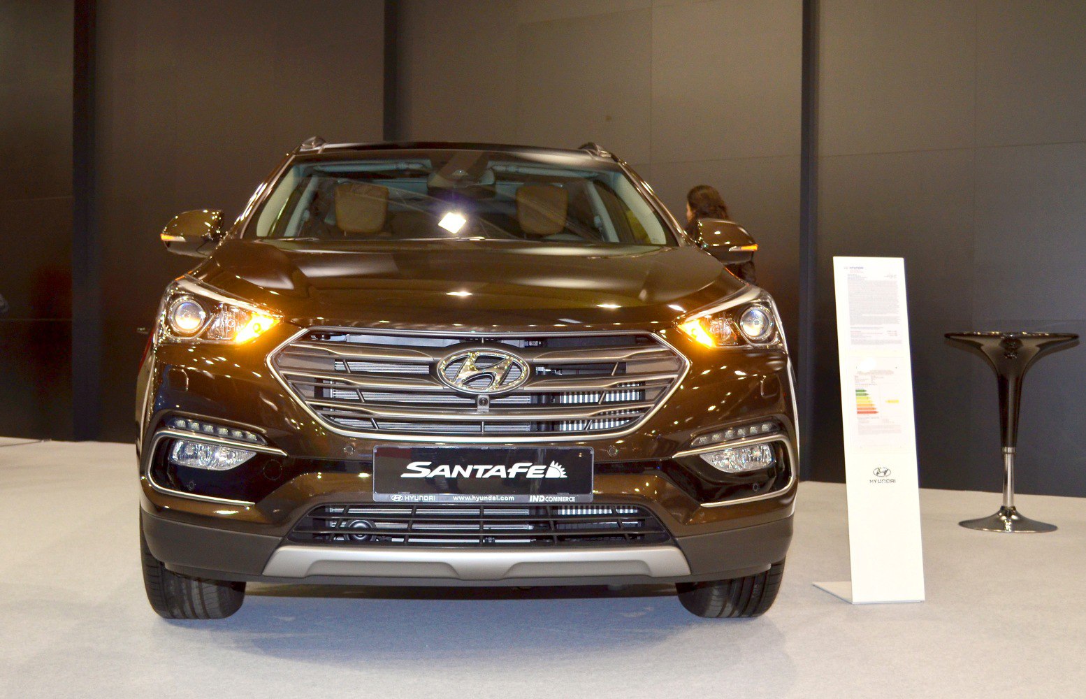 Front view with LED headlights and signature grille