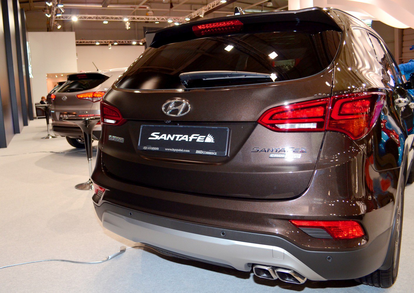Rear view of SUV featuring dual exhaust and tail lights
