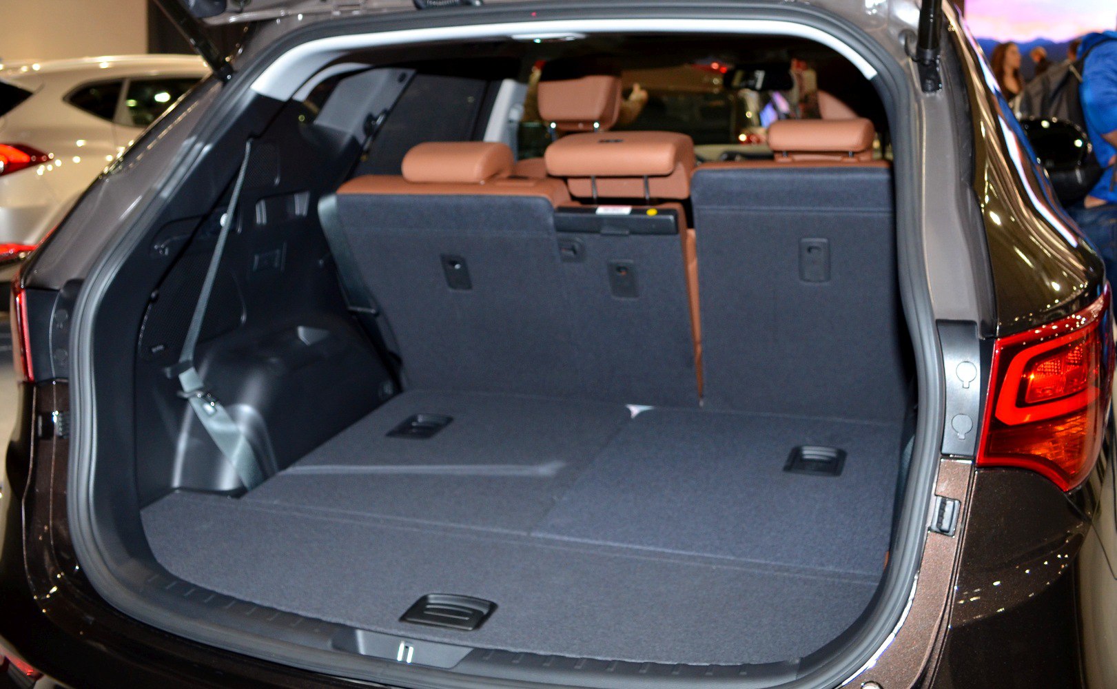 Large rear cargo space with split-folding seats and brown headrests