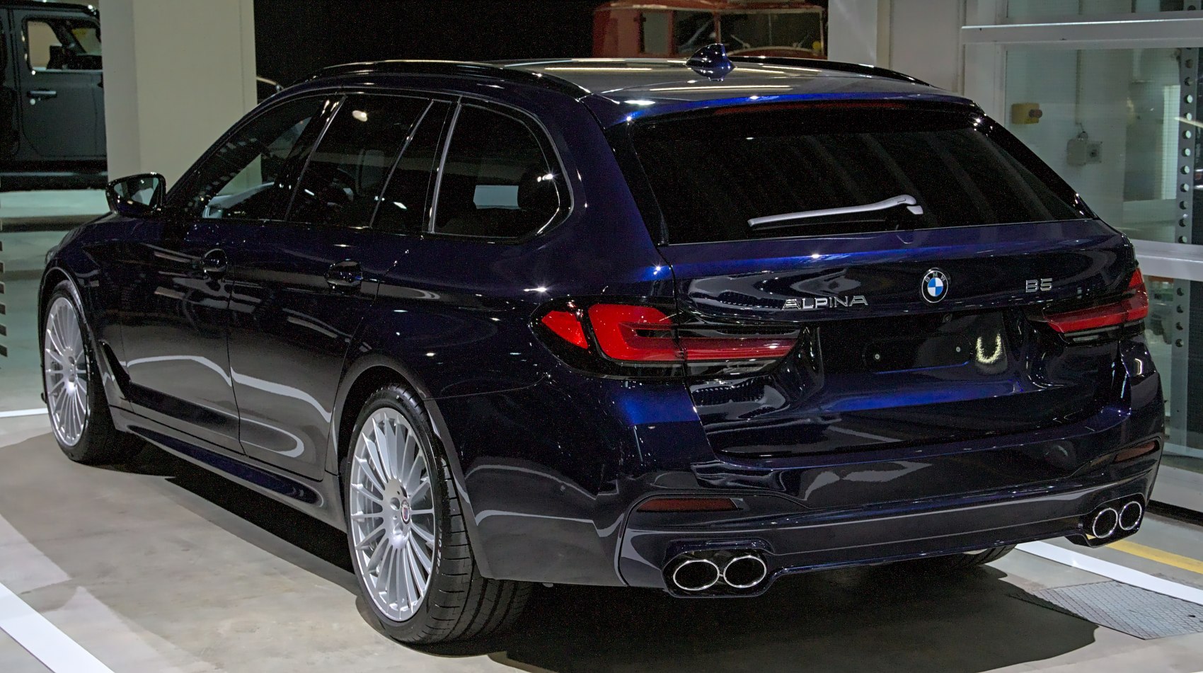 Rear view of Alpina B5 Touring with quad exhaust and tinted windows
