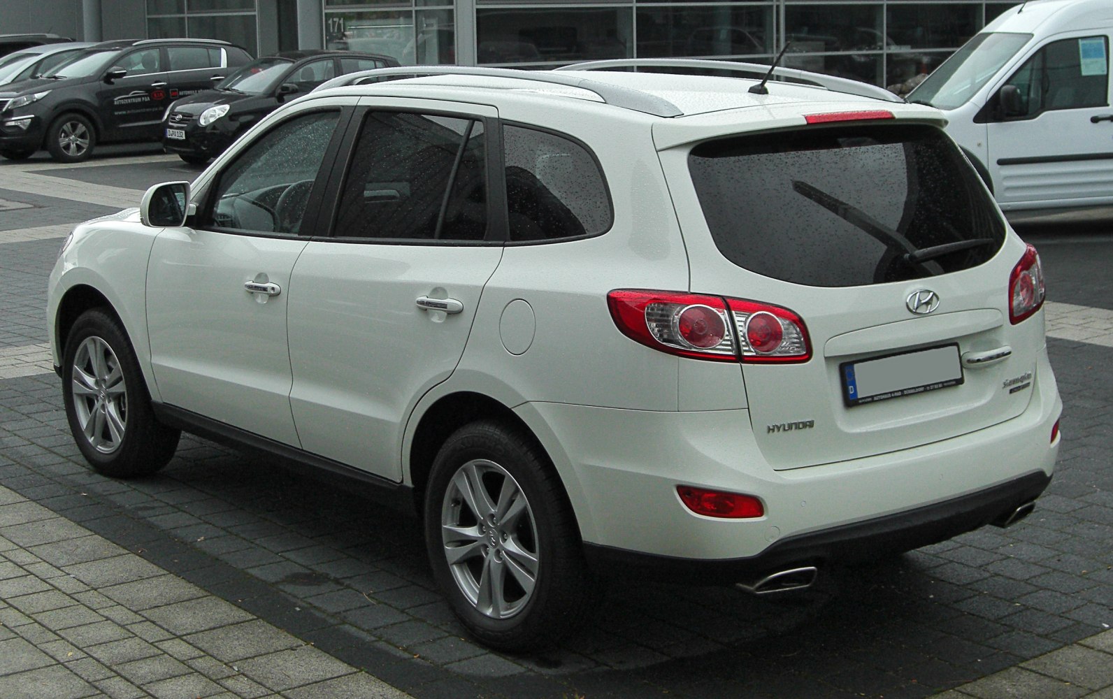 Rear and side view with taillights and alloy wheels
