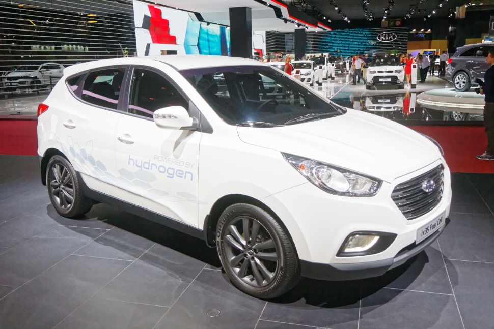 White hydrogen-powered SUV with hexagonal decal and modern styling