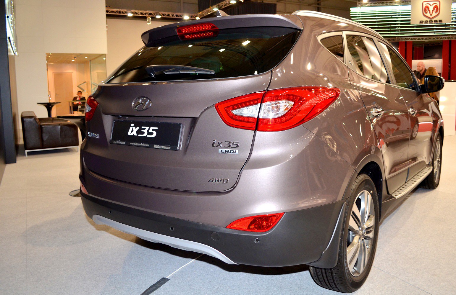 Rear view with taillights, AWD and CRDi badges, alloy wheels