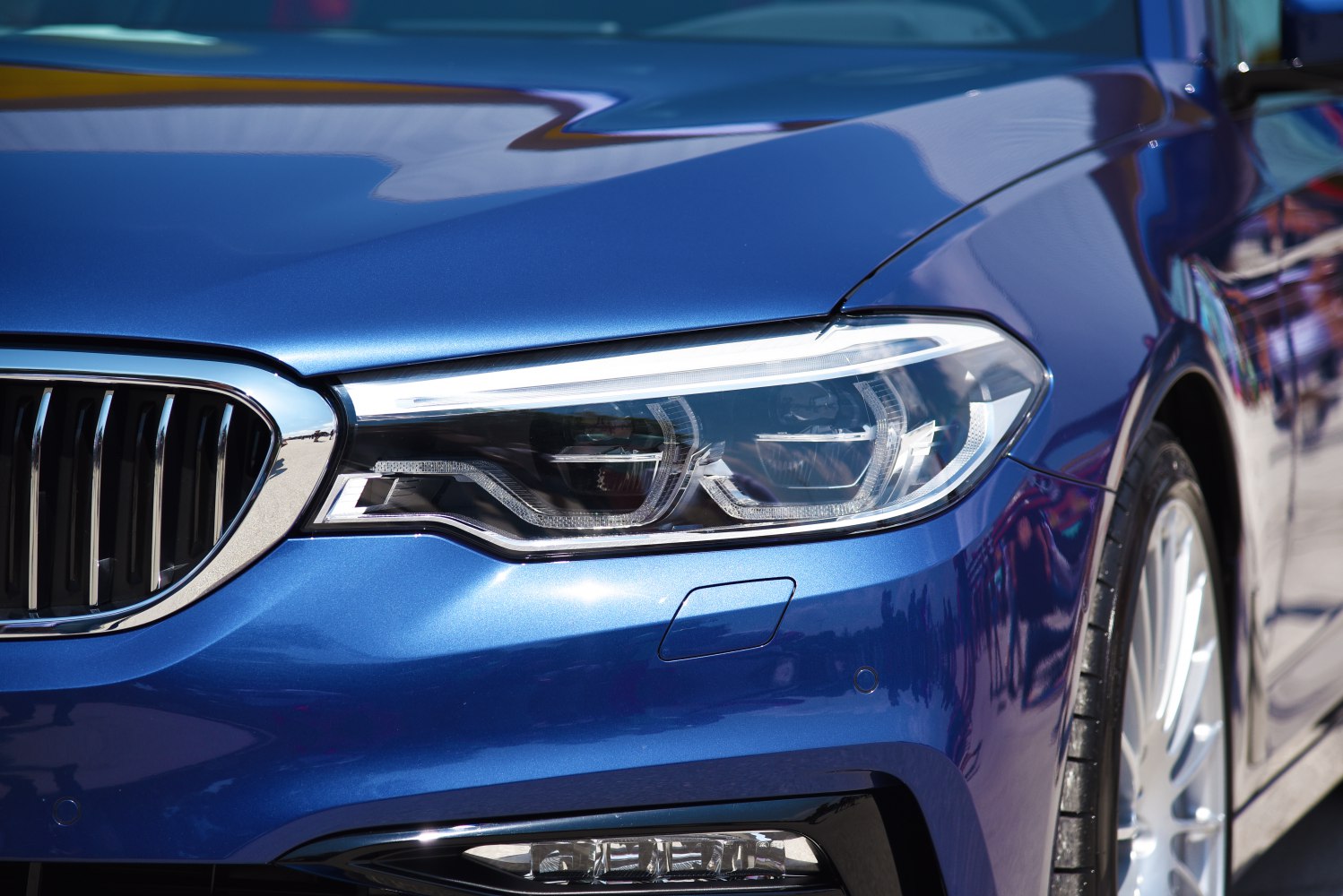 LED headlight and front grille with blue metallic paint