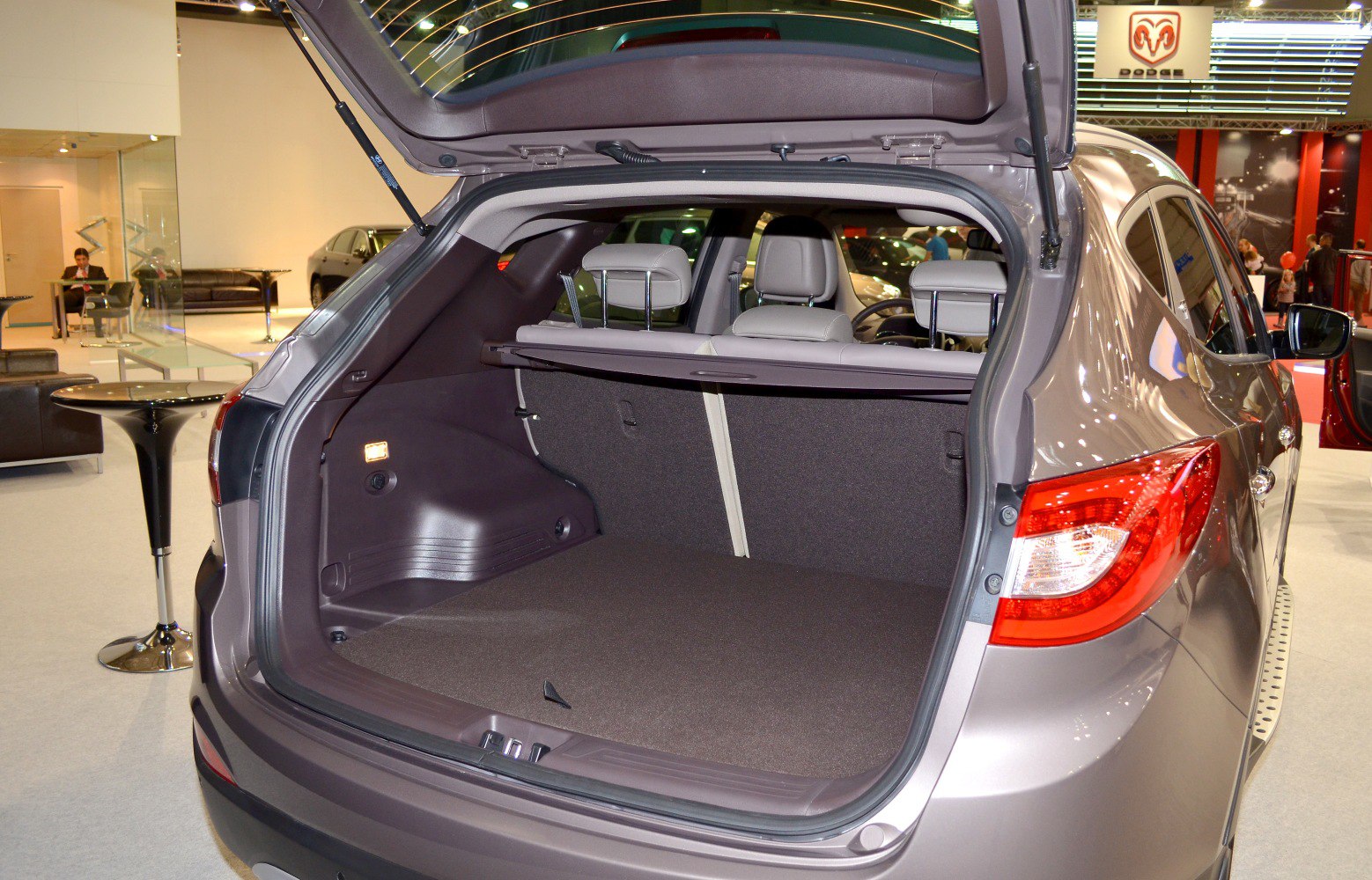 Open rear hatch with spacious cargo area and visible rear seats
