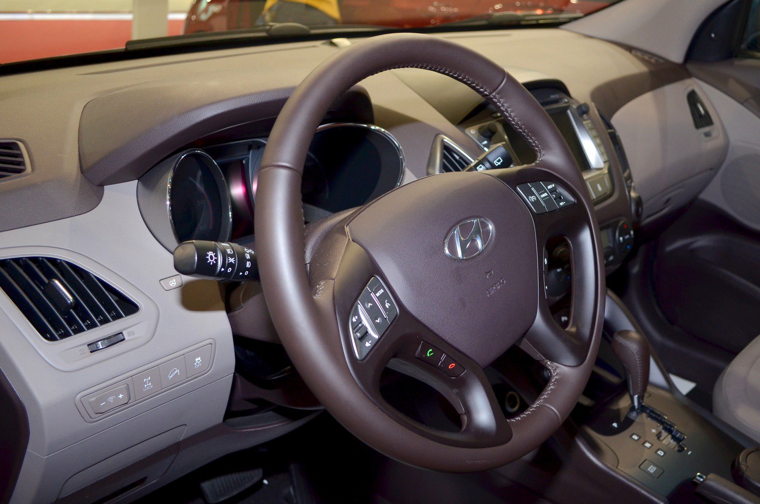 Steering wheel with integrated controls and dashboard interior