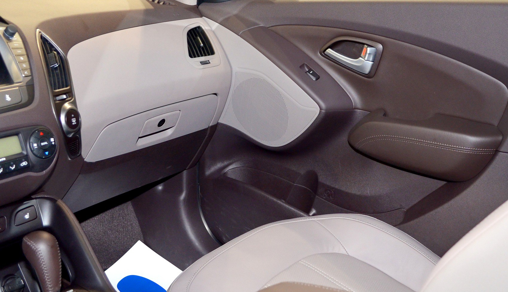 Car interior dashboard with door panel and air vents