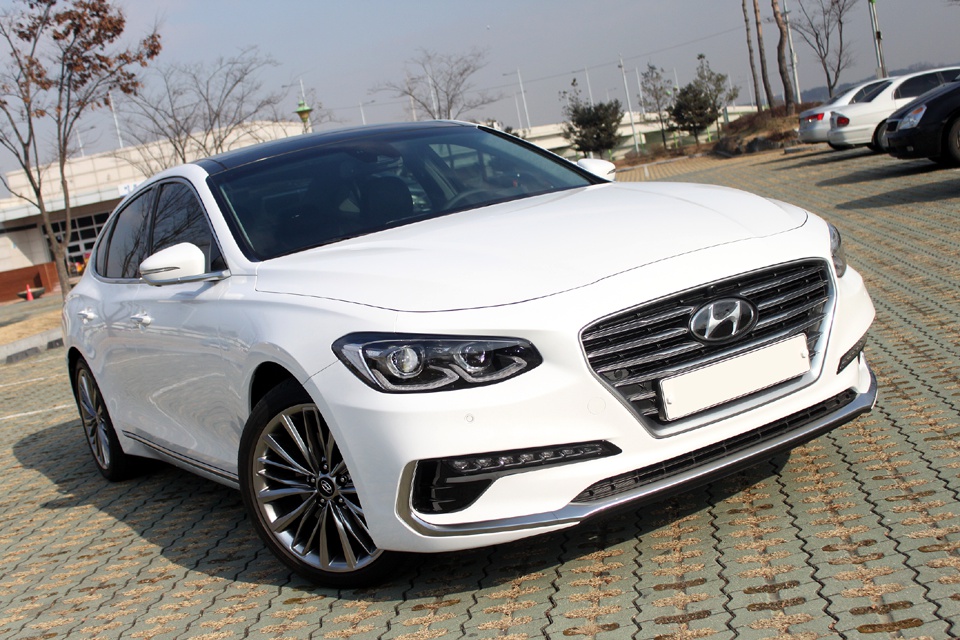 Front grille and headlights of a luxury sedan.