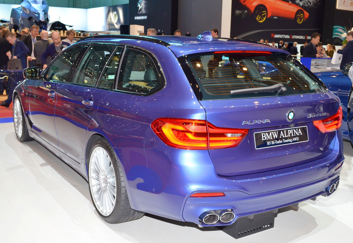 Blue touring wagon rear view with quad exhaust and sleek tail lights