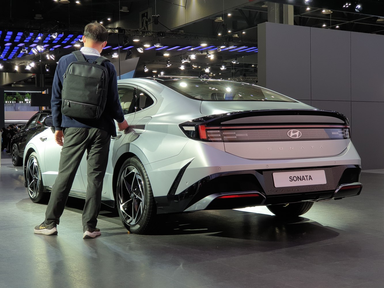 Sporty rear design with distinctive tail lights and modern sedan styling.