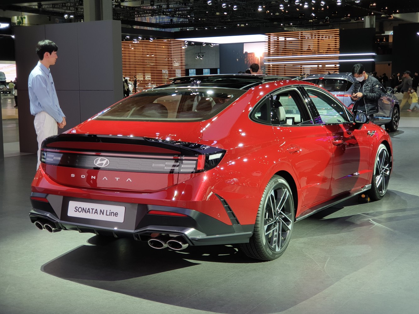 Sleek rear design with quad exhaust tips and modern tail lights.