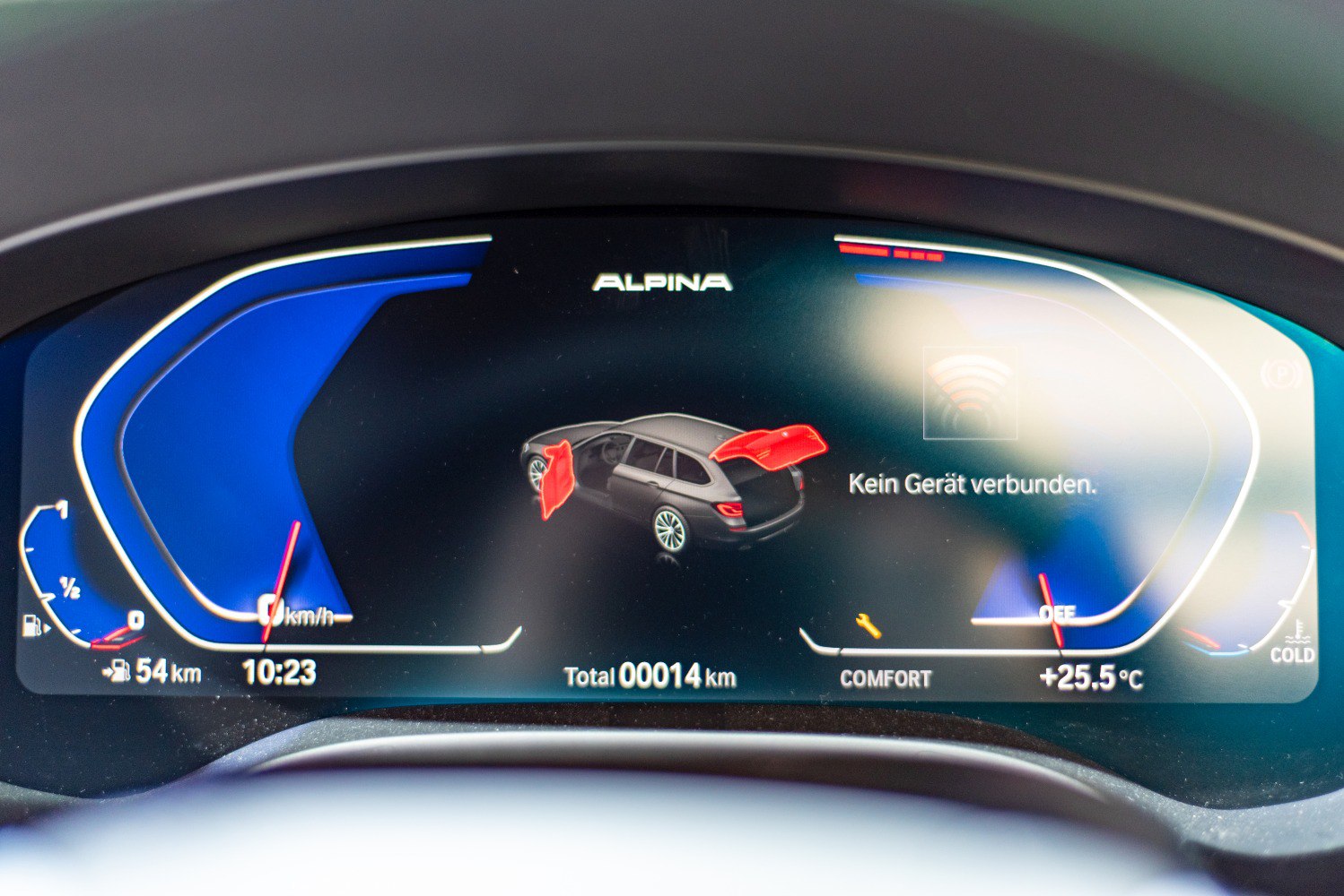 Digital instrument cluster displaying open doors and trunk warning in vehicle interior