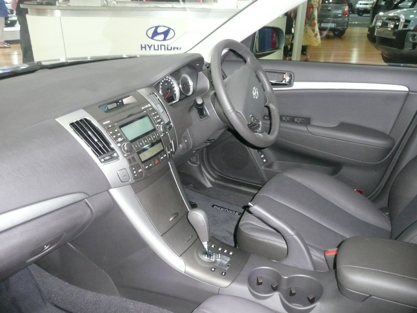 Dashboard, steering wheel, center console, and front seats interior