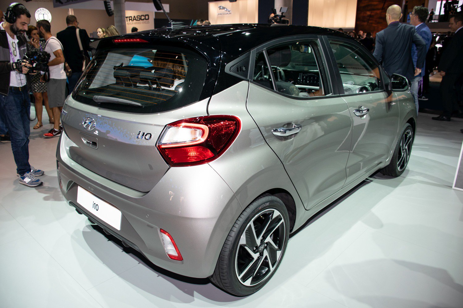 Rear view of hatchback with tail lights and alloy wheels