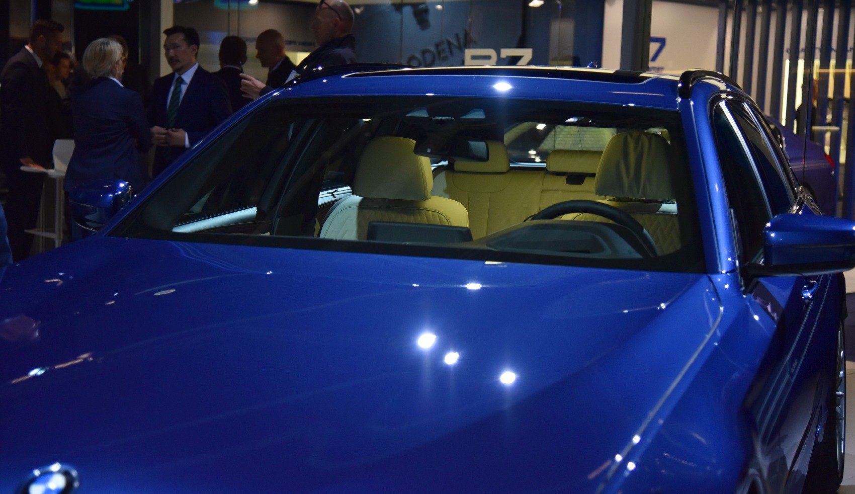 Blue station wagon with beige leather interior and sunroof