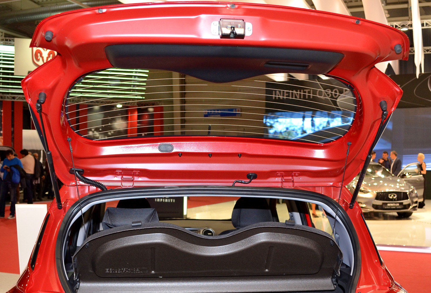 Open rear hatch showcasing parcel shelf and trunk interior