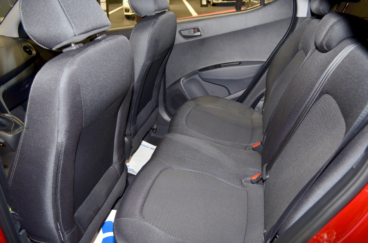 Rear fabric seats with seatbelt and compact car interior
