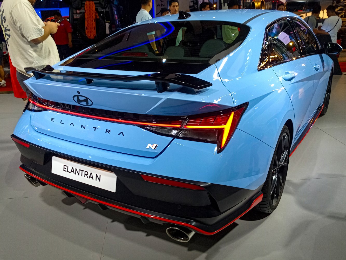 Sporty rear spoiler with LED taillights and dual exhaust