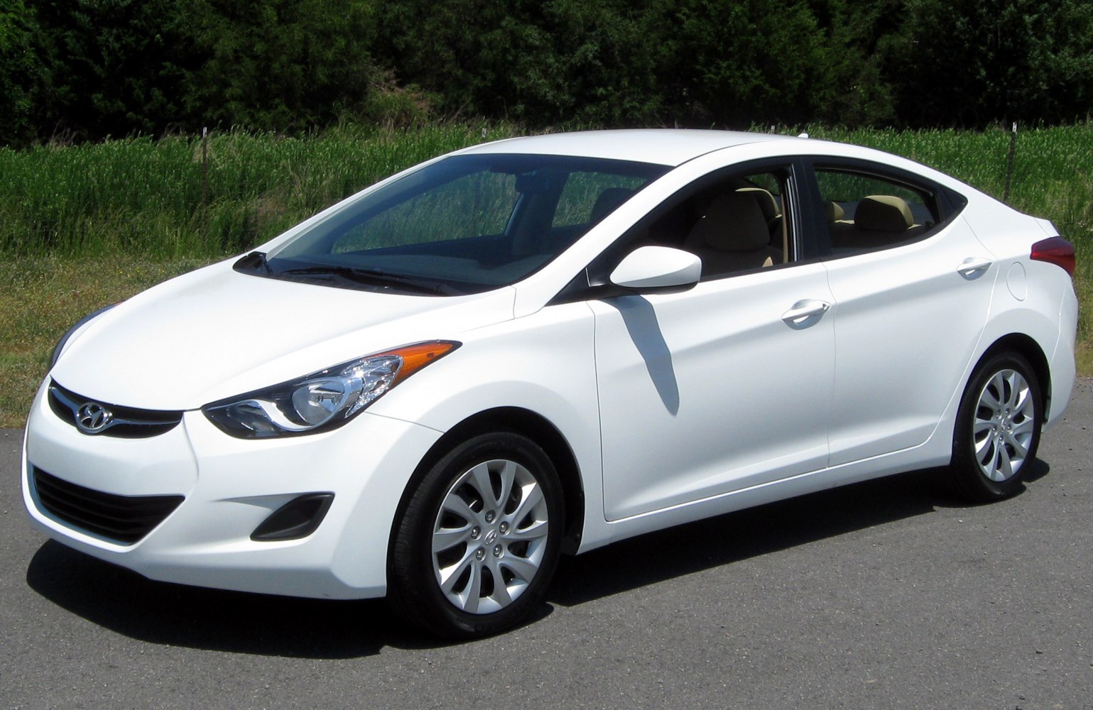 White compact sedan with sleek aerodynamic design
